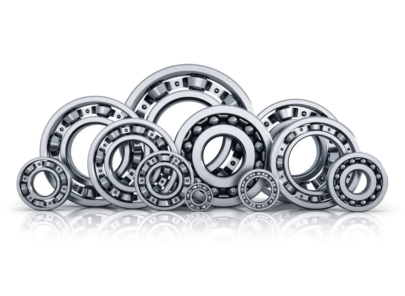 A group of different types of bearings on top of each other.