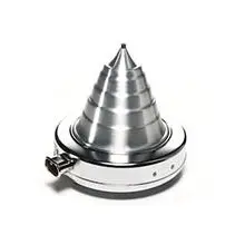 A metal cone sitting on top of a white table.