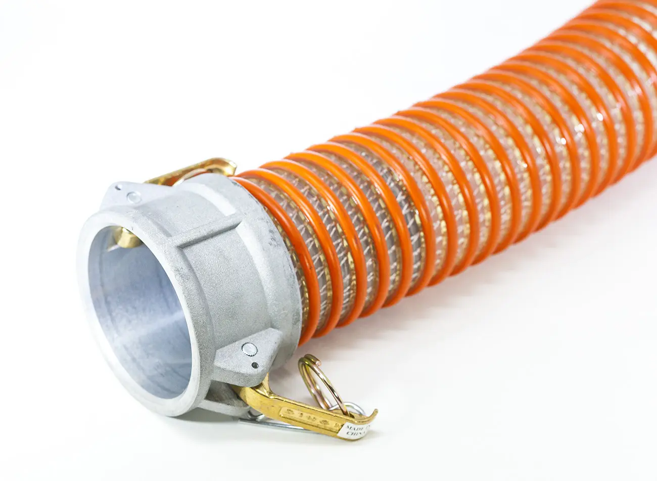 A close up of an orange hose with a metal clamp