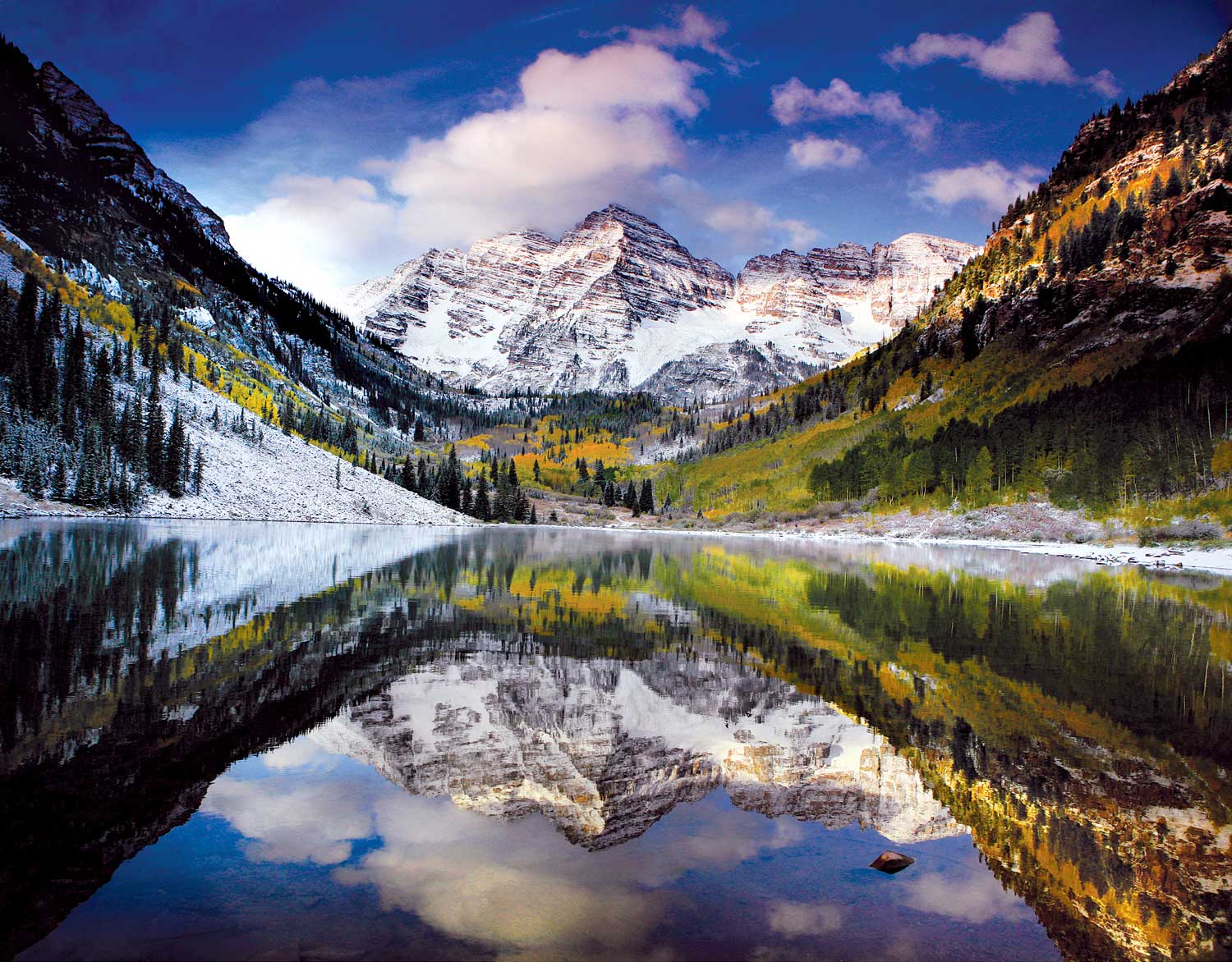 A mountain range with snow on the top of it.